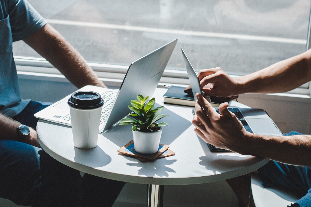 A team brainstorming session on strategies to scale your business, highlighted by engaging rocket graphics and growth charts