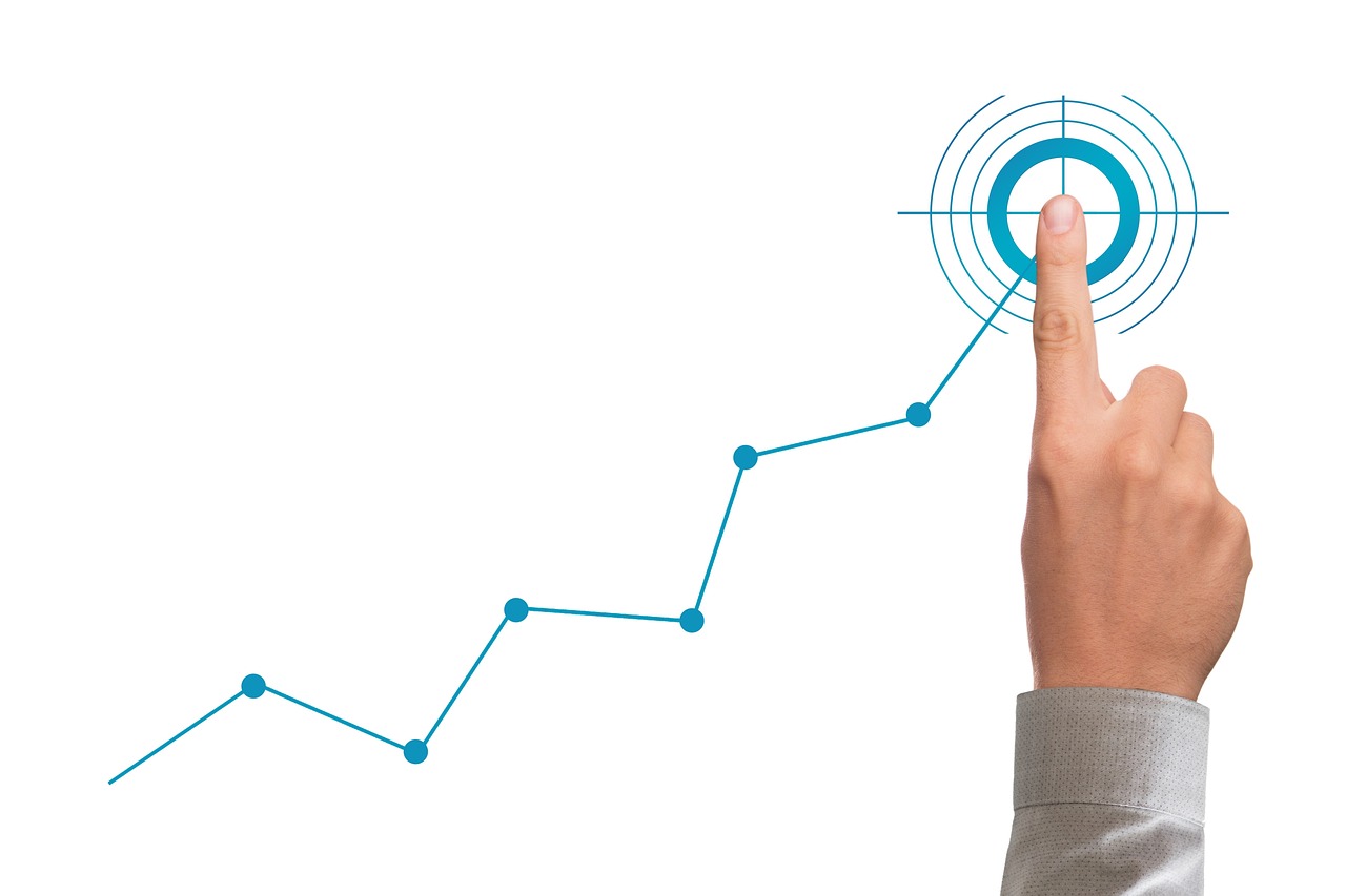 Graph depicting strategies to scale your business, with upward trends and rocket imagery, symbolizing growth acceleration.